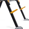 Close-up of the legs of a black and orange stand or work table. Anteprima dell’immagine prodotto