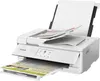 A white Canon PIXMA TS9551Ca printer is shown from a front-diagonal angle, with paper loaded in the input tray and output tray. Podgląd zdjęcia produktu