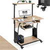 A computer desk with a monitor, keyboard, computer tower, and game console. Náhled obrázku produktu
