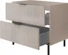 A beige matte washbasin cabinet with two drawers, one of which is partially open. Anteprima dell’immagine prodotto