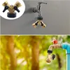 Two images showing a Y-shaped water splitter attached to a faucet. Produktbild-Vorschau