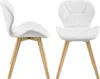 Two white chairs with wooden legs are shown from different angles against a white background. Anteprima dell’immagine prodotto