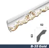 A white decorative molding with gold accents, shown diagonally against a white background, with dimension indicators. Produktbild-Vorschau