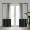 Two black and gray curtains hanging in front of a window. Produktbild-Vorschau