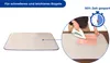 A product image showing an ironing mat and a close-up of someone ironing a pink fabric with an iron on a table. Produktbild-Vorschau