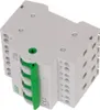 A white electrical switch module with a green lever. Náhľad obrázku produktu