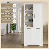 A white bathroom cabinet with shelves and doors, showcasing various toiletries and towels. The image also includes informational text overlays on the left side. Náhled obrázku produktu