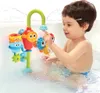A young child is playing with a bath toy in a bathtub. Podgląd zdjęcia produktu