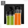 Two portable blender cups filled with green and orange smoothies, with black lids, against a black background. Podgląd zdjęcia produktu