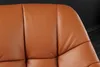 A close-up view of the stitched leather upholstery of a chair. Produktbild-Vorschau