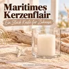 Seestern an einer Tischkarte neben hellem Sand in flacher Schale Produktbild-Vorschau
