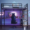 A loft bed with a desk and shelves underneath, set up in a gaming room with neon lights. Náhled obrázku produktu