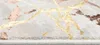 A close-up view of a rug with a marble-like pattern in beige, gold, and rose gold. Voir les images du produit