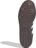 The underside of a black and white Adidas Samba shoe. Náhled obrázku produktu