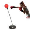 A woman is shown boxing with a punching bag. Produktbild-Vorschau