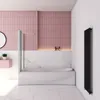 A modern bathroom with a bathtub and shower screen. Produktbild-Vorschau