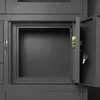 Close-up view of an open gray safe with keys. Anteprima dell’immagine prodotto