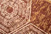 A close-up view of a rug with a geometric pattern. Anteprima dell’immagine prodotto