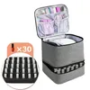 A multi-part image showing a gray storage bag for nail polish and accessories, along with a close-up of nail polish bottles in a holder and a separate graphic indicating 'x30'. Produktbild-Vorschau