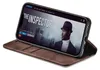 A brown flip case for an iPhone 13 is shown open, with the phone displaying a movie poster for 'The Inspector'. Produktbild-Vorschau