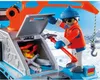 A toy figure is interacting with a toy vehicle in a snowy environment. Podgląd zdjęcia produktu