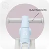Close-up of the handlebars of a child's balance bike, highlighting the grips. Voir les images du produit