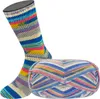 A knitted sock displayed on a mannequin leg next to a ball of yarn of the same pattern. Produktbild-Vorschau