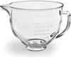 A clear glass mixing bowl with measurement markings. Voir les images du produit