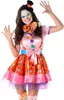 A woman dressed as a clown in a colorful costume, posing against a white background. Produktbild-Vorschau