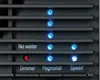 Close-up of indicator lights and labels on a device. Produktbild-Vorschau