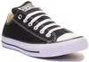 A black Converse All Star sneaker with white laces and white soles, shown from a side angle against a white background. Voir les images du produit
