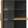 A close-up view of a modern desk with shelves, showing the combination of dark grey and wood-like finishes. Anteprima dell’immagine prodotto