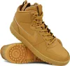A pair of brown Nike Court Borough Mid Winter sneakers are shown against a white background. Produktbild-Vorschau
