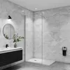 A modern bathroom with a walk-in shower, vanity, and mirror. Produktbild-Vorschau