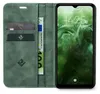 A green flip case for a smartphone is open, showing card slots and a banknote, with the smartphone screen displaying the time and date. Produktbild-Vorschau