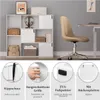 A white bookshelf with various items on display, next to a beige office chair and a desk. Produktbild-Vorschau