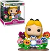 A Funko Pop! Deluxe figure of Alice from Disney's Alice in Wonderland, surrounded by colorful flowers, with its packaging visible in the background. Podgląd zdjęcia produktu