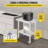 A stainless steel work table with a rice cooker and plates, in a kitchen setting. Anteprima dell’immagine prodotto
