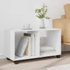 A white rolling cabinet with two compartments, one filled with books and the other empty, sits on a light wooden floor. Náhled obrázku produktu