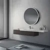 A modern bathroom vanity with a round, illuminated mirror above it. Náhled obrázku produktu