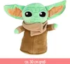 A plush toy of Baby Yoda from The Mandalorian is shown against a white background. Produktbild-Vorschau