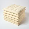 A stack of cream-colored seat cushions on a white background. Anteprima dell’immagine prodotto