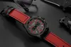 A close-up shot of a men's watch with a red leather strap, placed on a black surface. Other items like glasses and a knife are visible in the background. Produktbild-Vorschau
