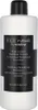 A white bottle of shampoo with a black label and cap. Anteprima dell’immagine prodotto