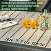 A close-up view of an outdoor dining table with glasses of amber liquid and bottles of beverage. Náhľad obrázku produktu