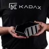 A person is holding a black storage box. Produktbild-Vorschau