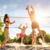 People playing beach volleyball on a sunny day. Anteprima dell’immagine prodotto