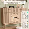 A wooden sideboard with drawers and cabinets, featuring an anti-tip safety warning and installation diagram. Podgląd zdjęcia produktu