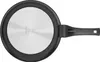 The underside of a frying pan is shown against a white background. Náhľad obrázku produktu
