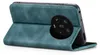 A teal flip cover case for a smartphone, shown open and propped up. Produktbild-Vorschau